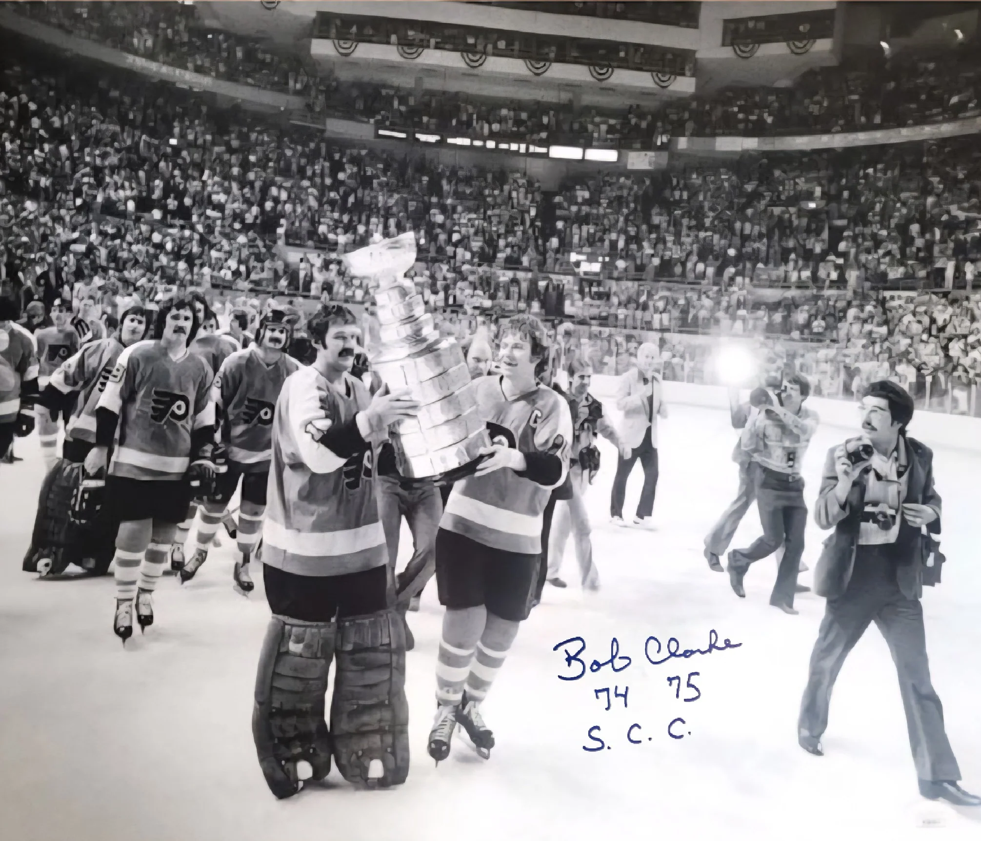 Bob Clarke Stanley Cup Celebration Philadelphia Flyers Autographed 16" x 20" Hockey Photo: SC Champs